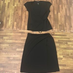 This is a full black suit comes with the blouse and skirt from Kenneth Cole.